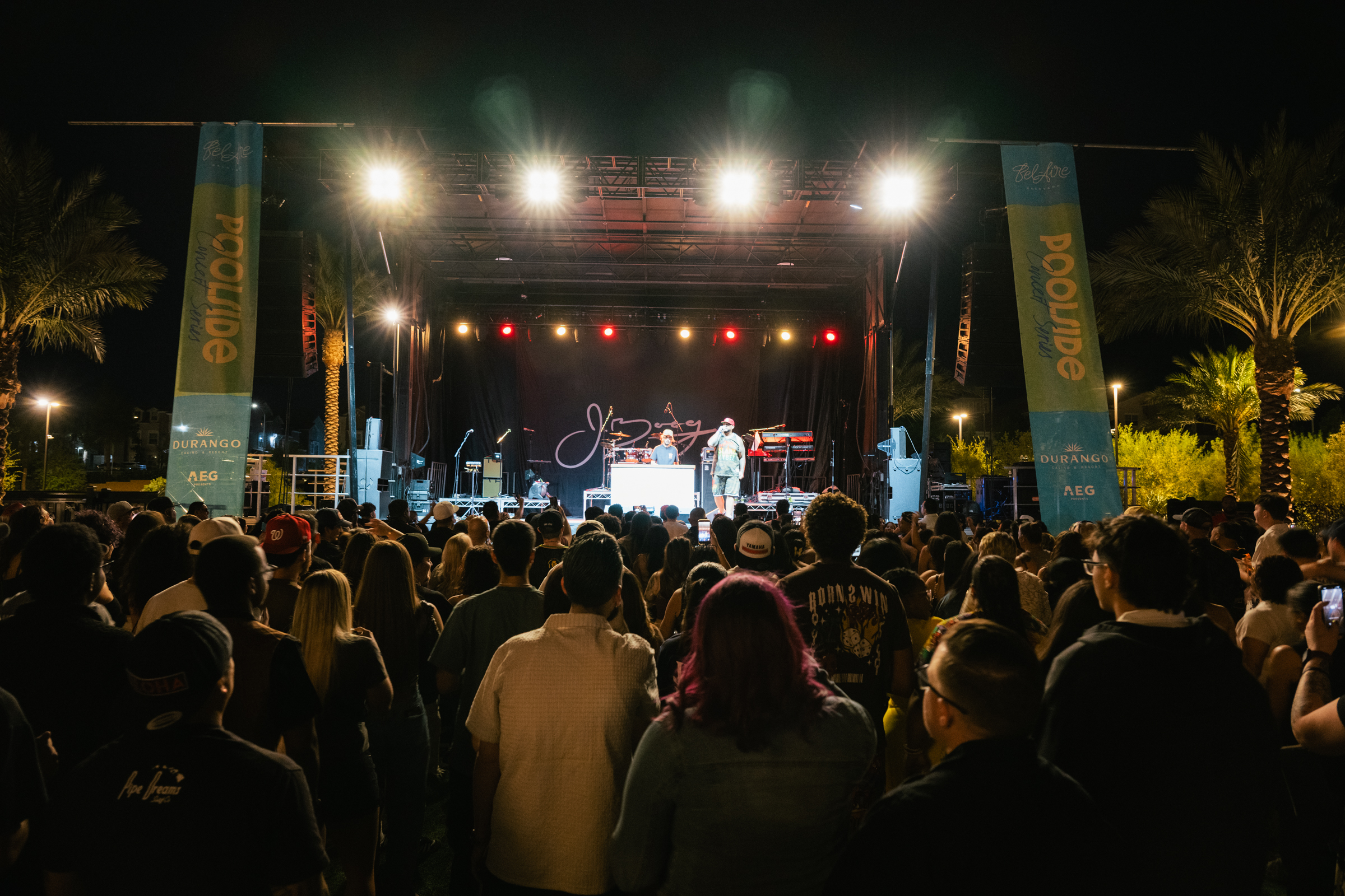 Crowd enjoying a live performance during the Poolside Concert Series at Bel-Aire Backyard, an outdoor concert venue at Durango Resort in Las Vegas.
