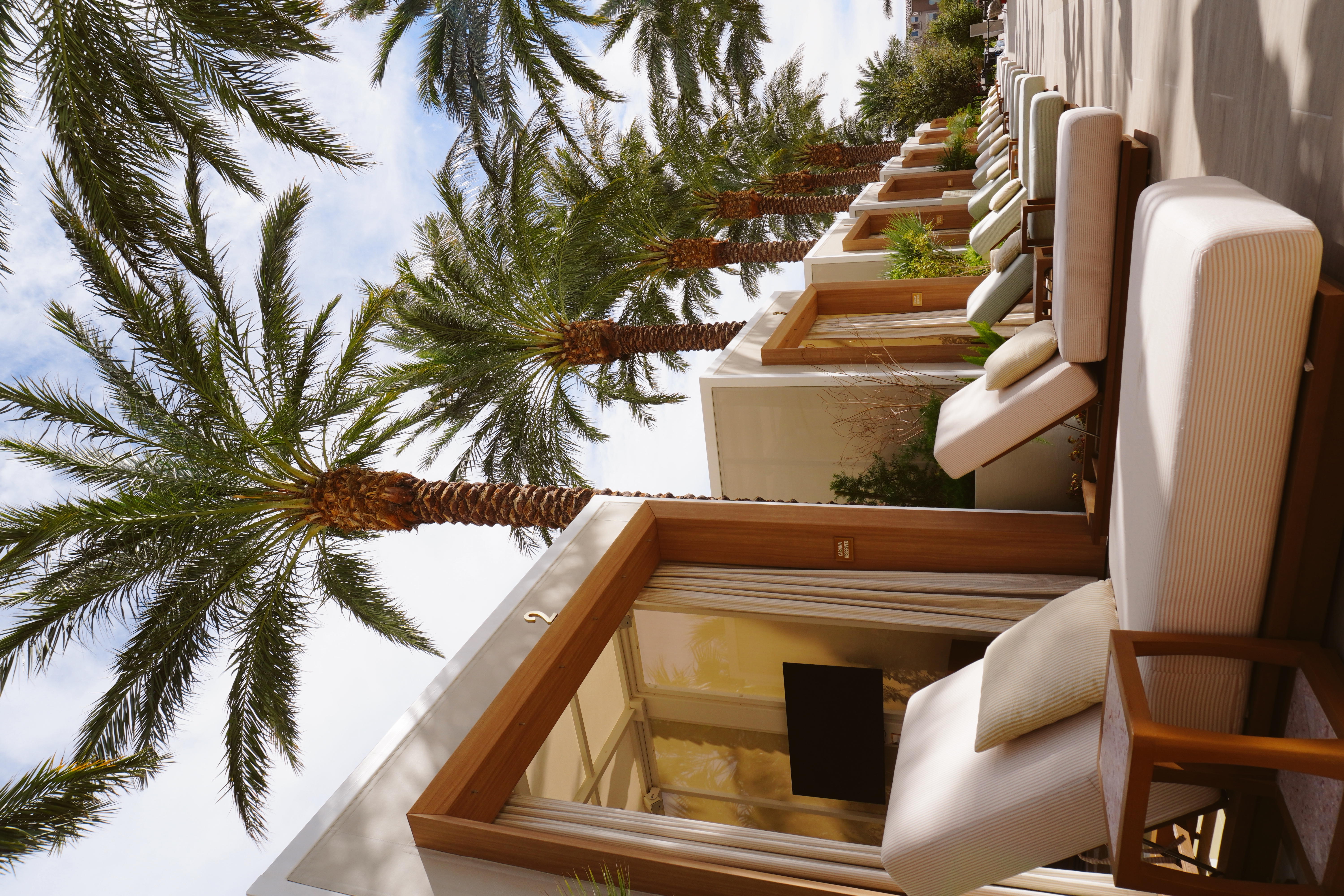Luxury cabanas and lounge chairs at Bel-Aire Backyard resort pool in Las Vegas, offering a relaxing pool near me experience at Durango Casino.