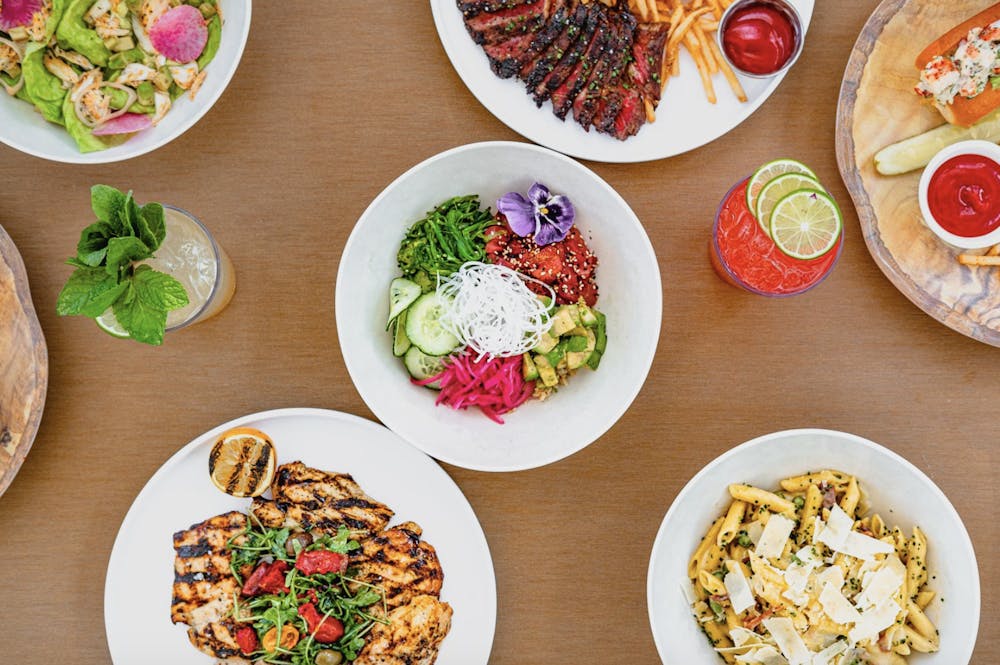 a spread of food at the Las Vegas pool bar, Bel-Aire Backyard