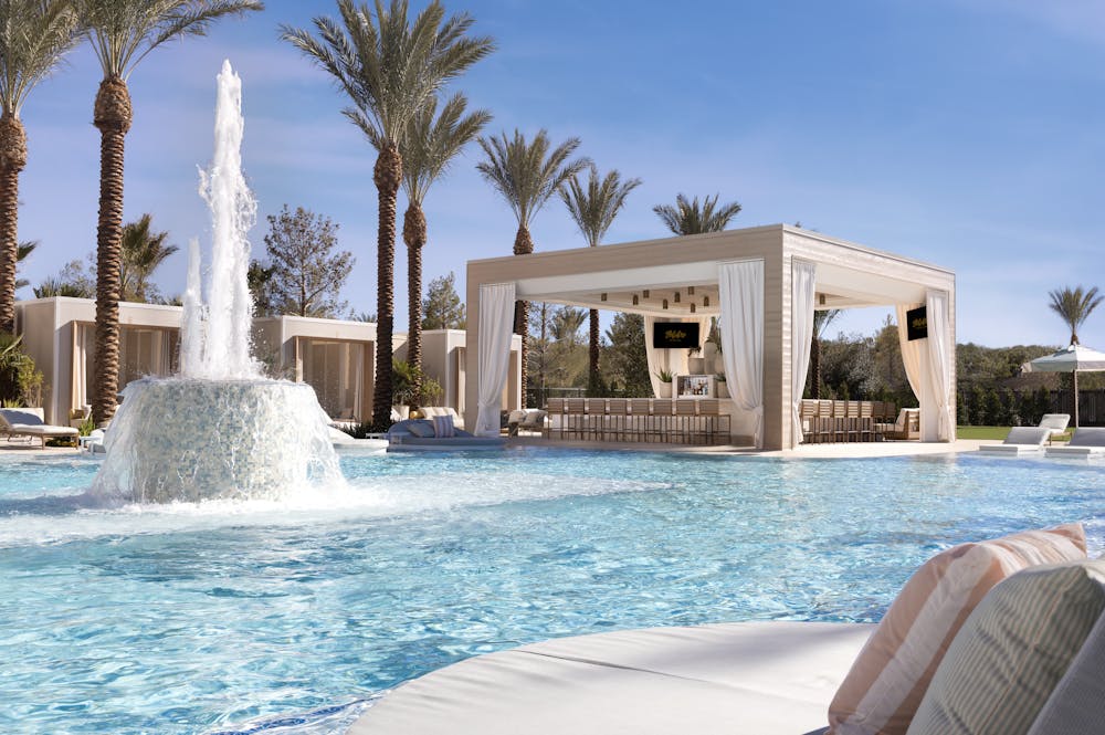 architectural shot of Bel-Aire Backyard pool fountain and bar