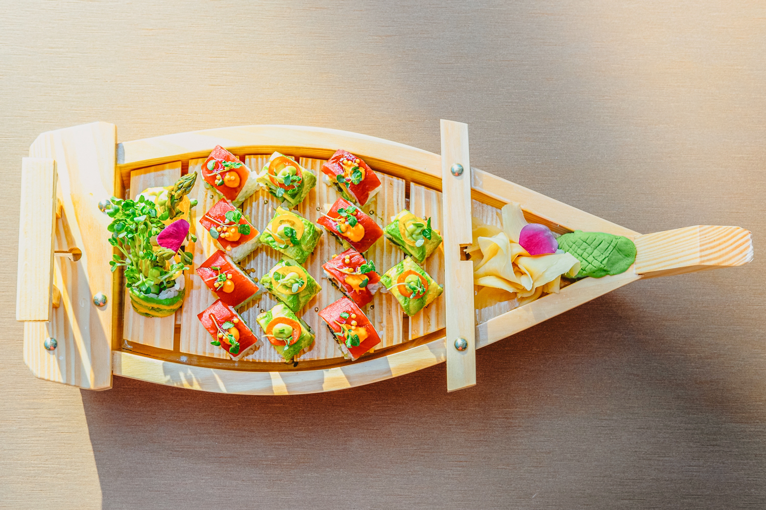 a photo of the bel-aire sushi yacht served at belaire backyard, an outdoor dining area 