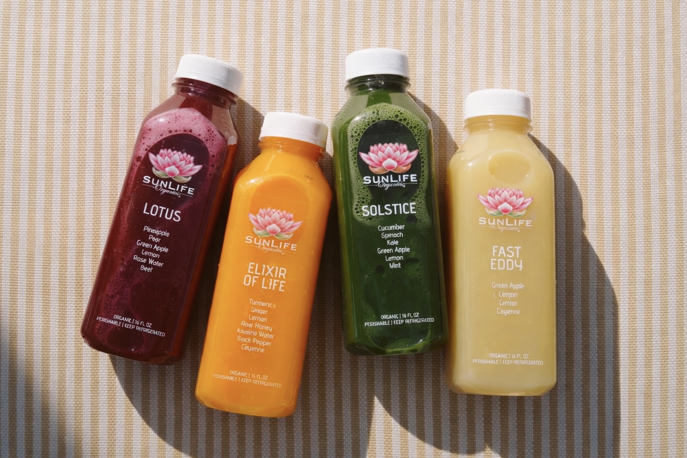 SunLife Organics juices at Bel-Aire Backyard featuring Lotus, Elixir Of Life, Solstice and Fast Eddy for outdoor dining in Las Vegas.