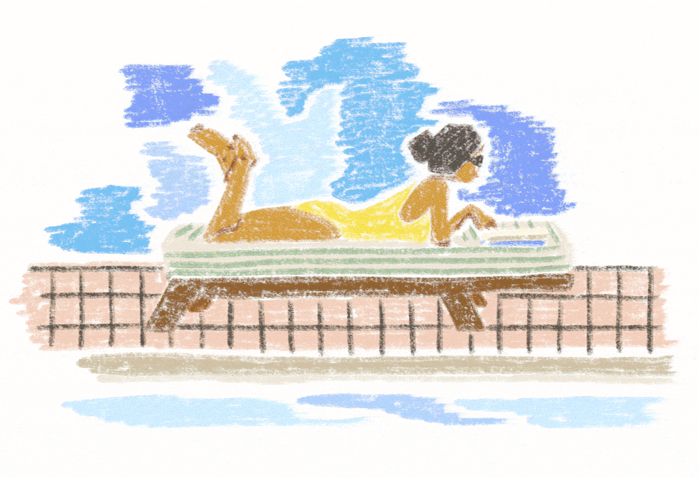 a group of people sitting at a table with a birthday cake