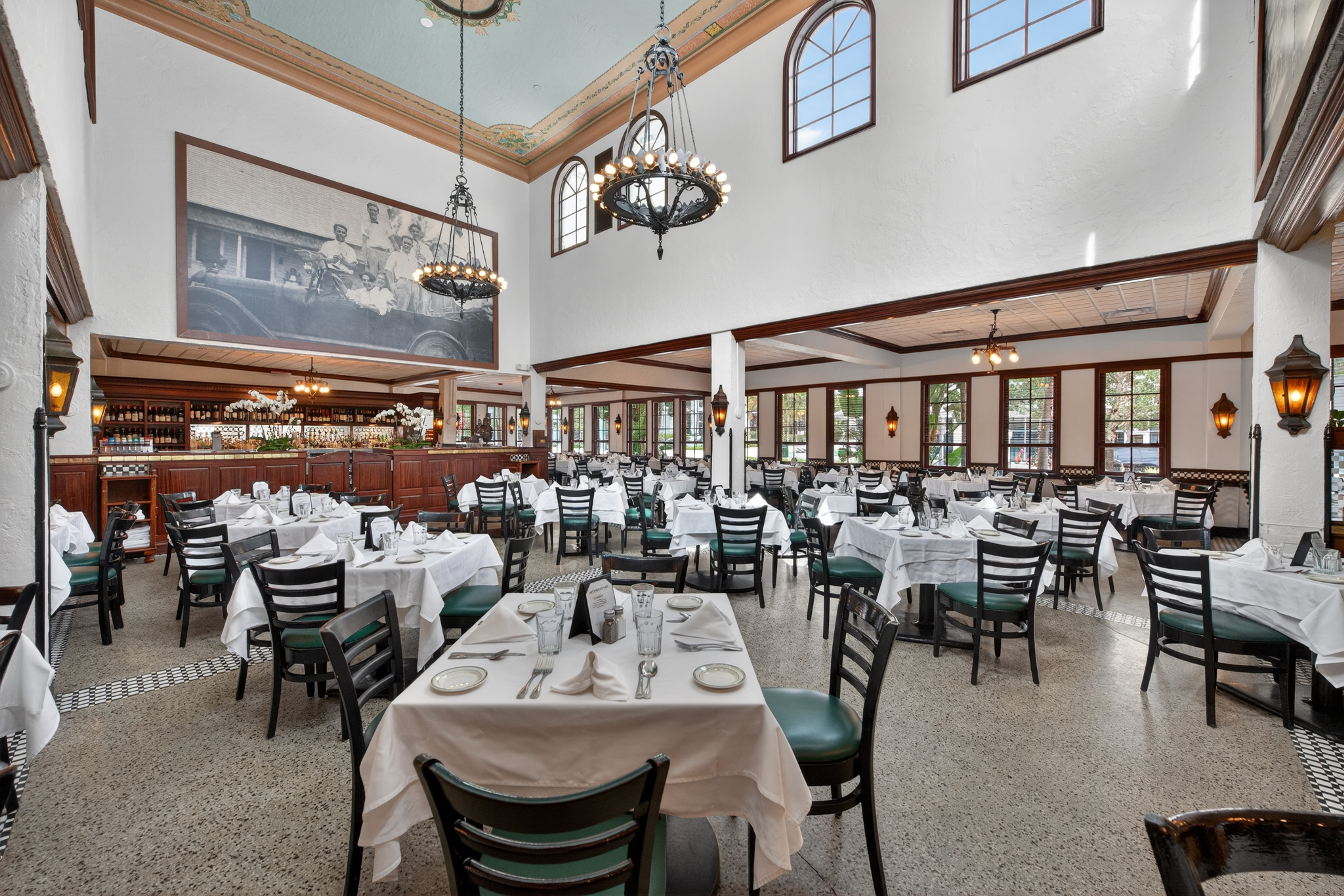 a room with tables and chairs