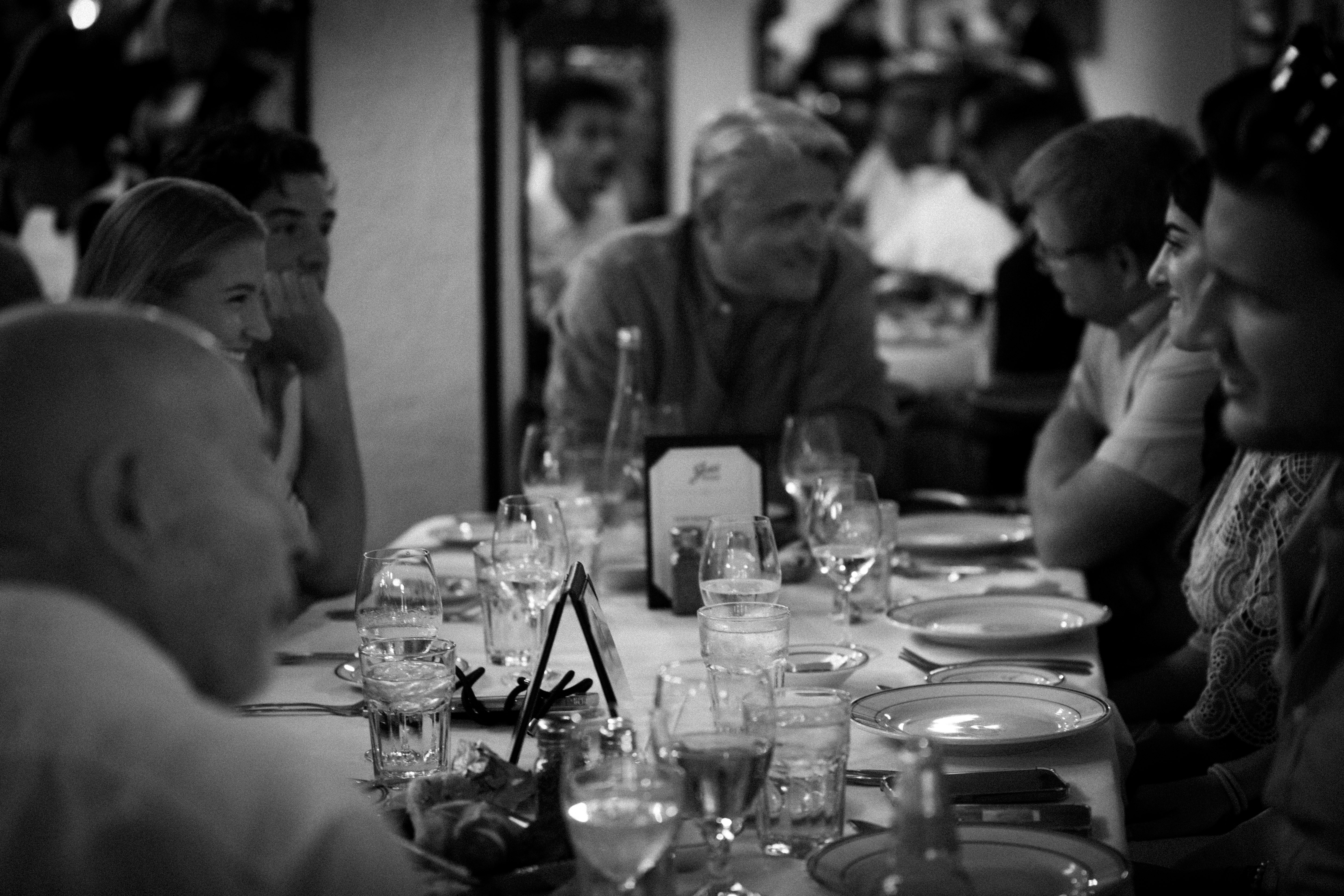 a group of people by a table