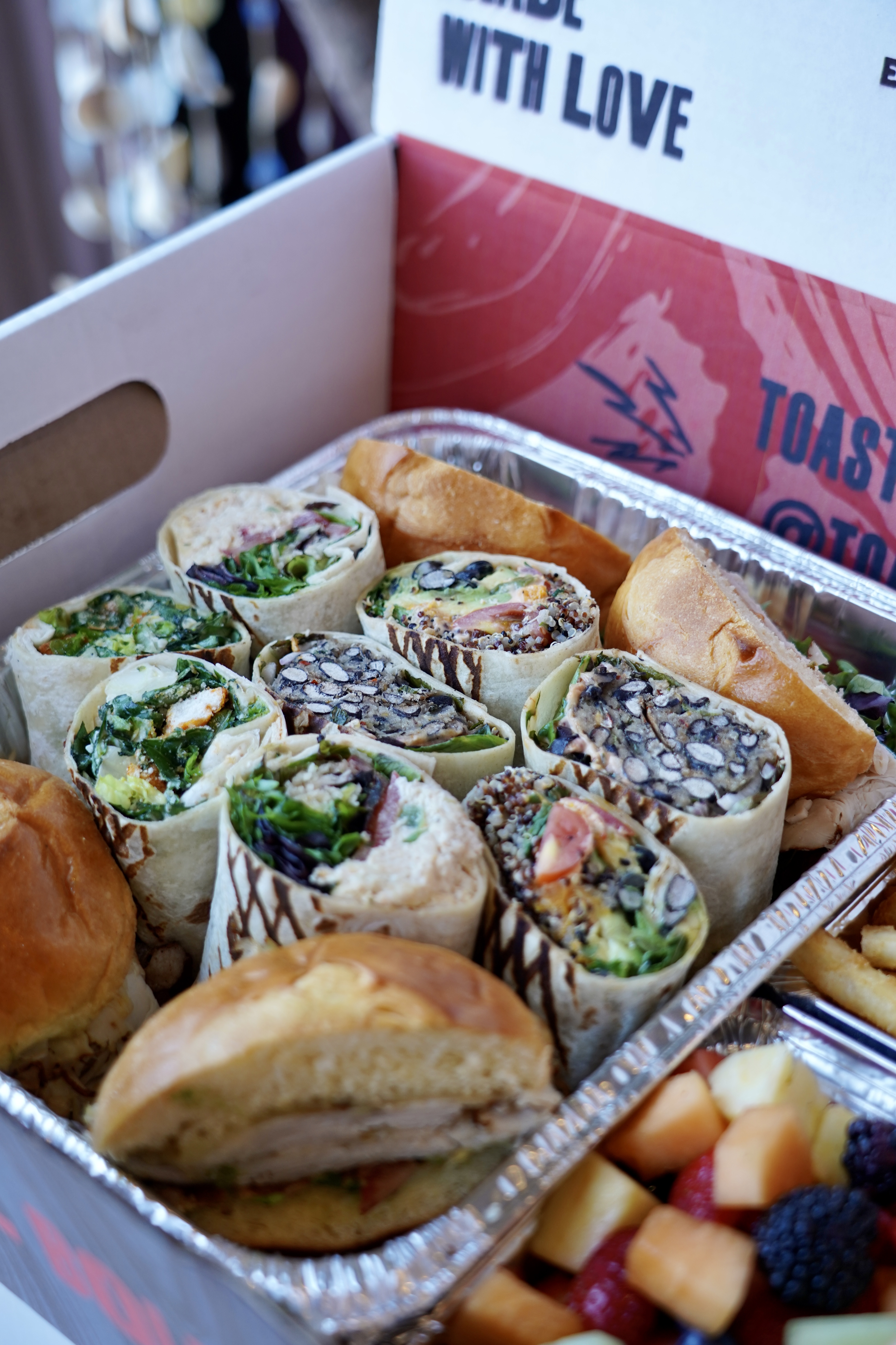 A close up image of assorted lunch wraps and sandwiches