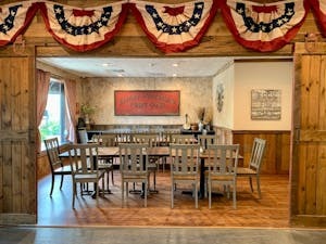 a room with a table and chairs