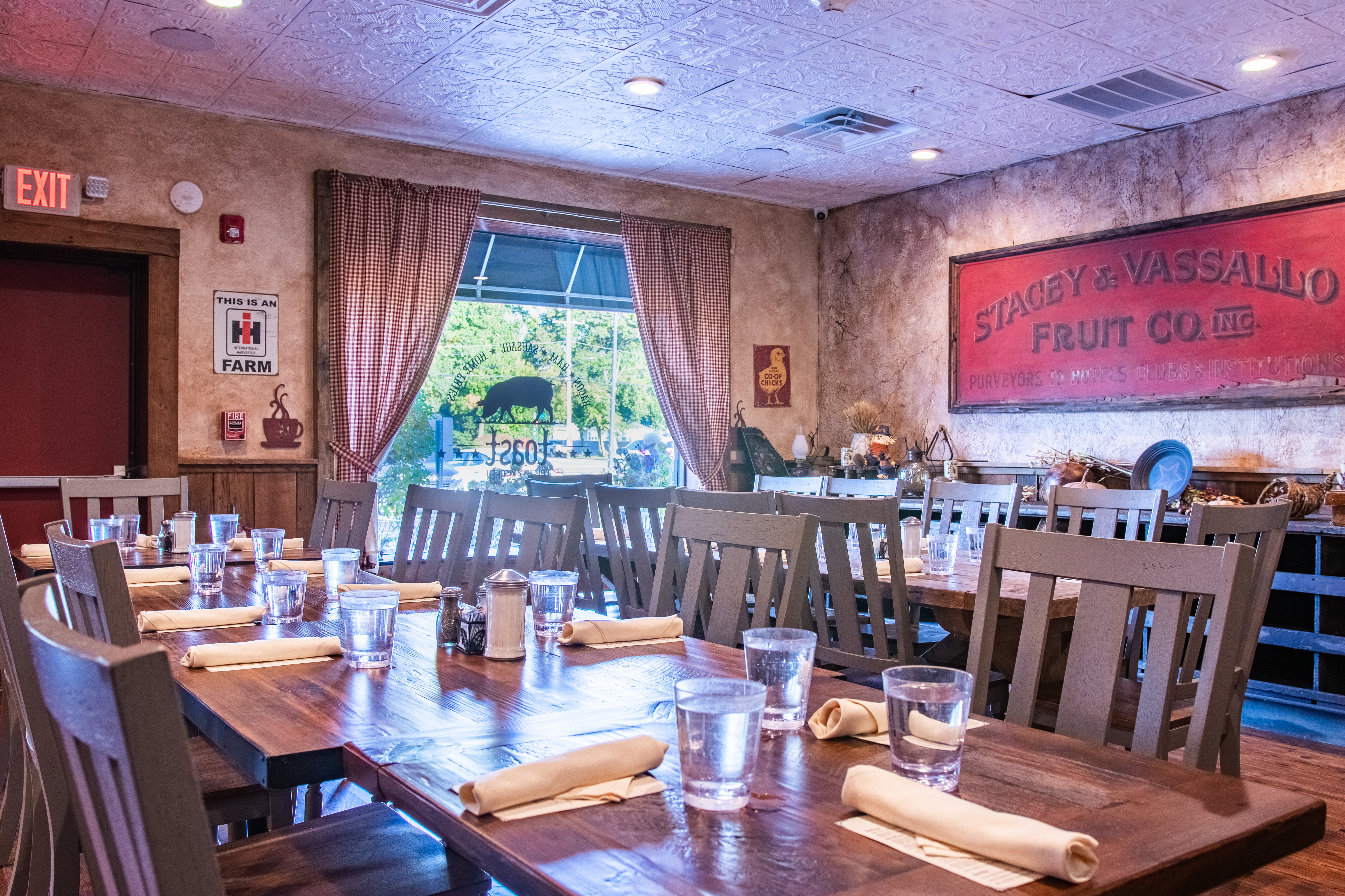 BARN ROOM - set for a private event for 22 guests, with rustic decor