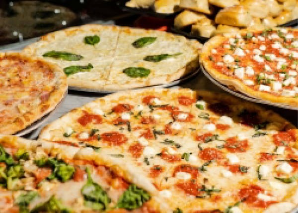 a pizza sitting on top of a table