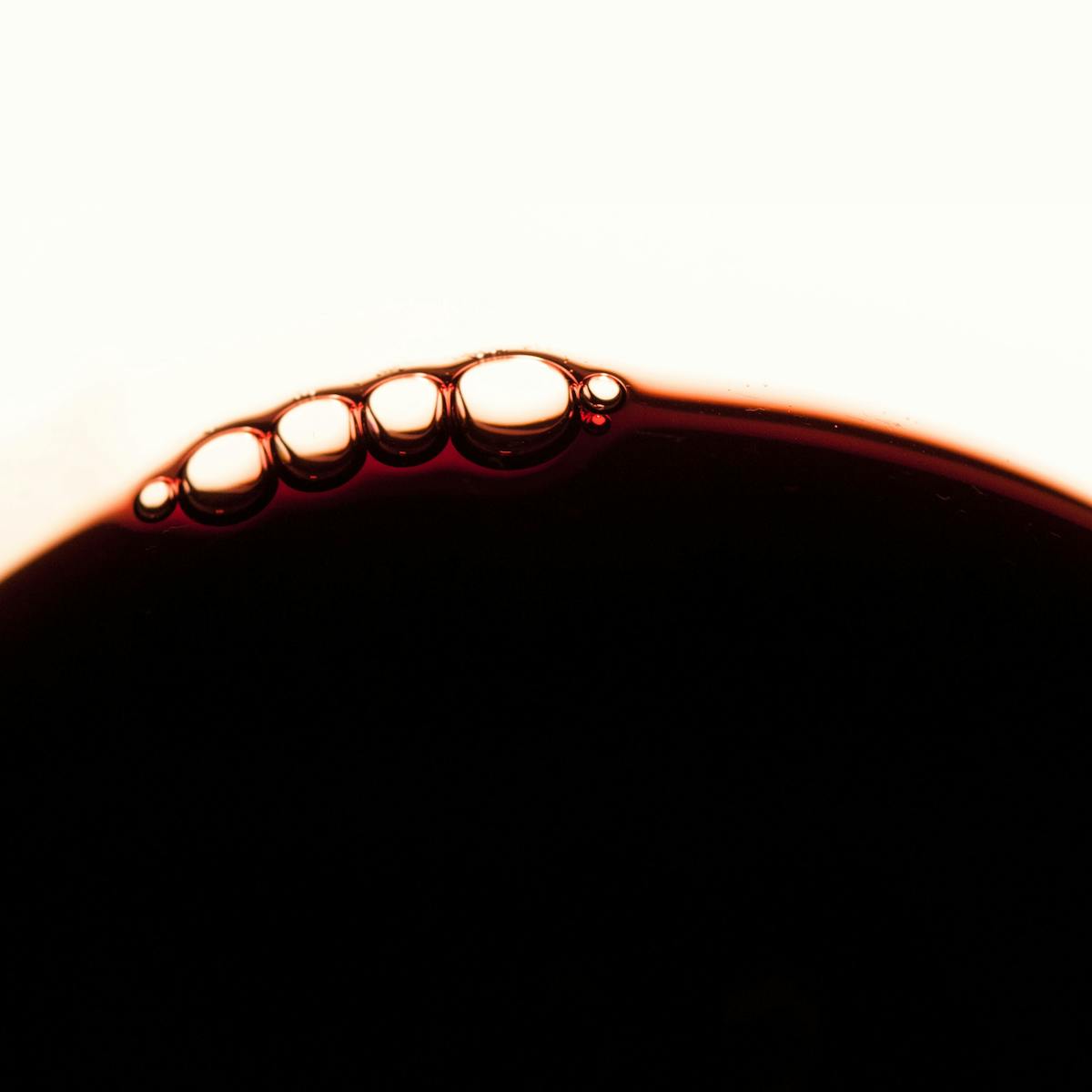 a close up of red wine