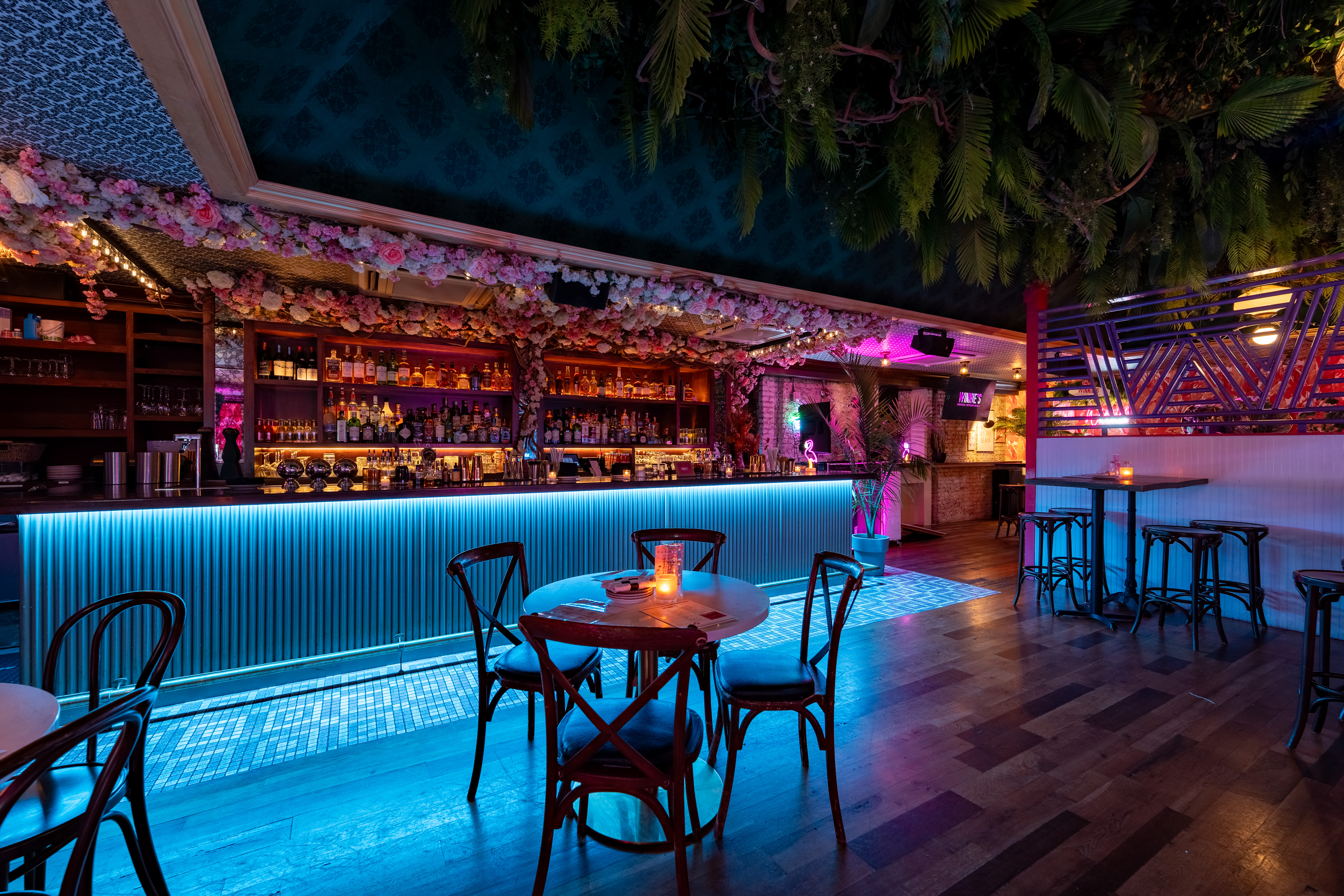 a dining room table in front of a body of water