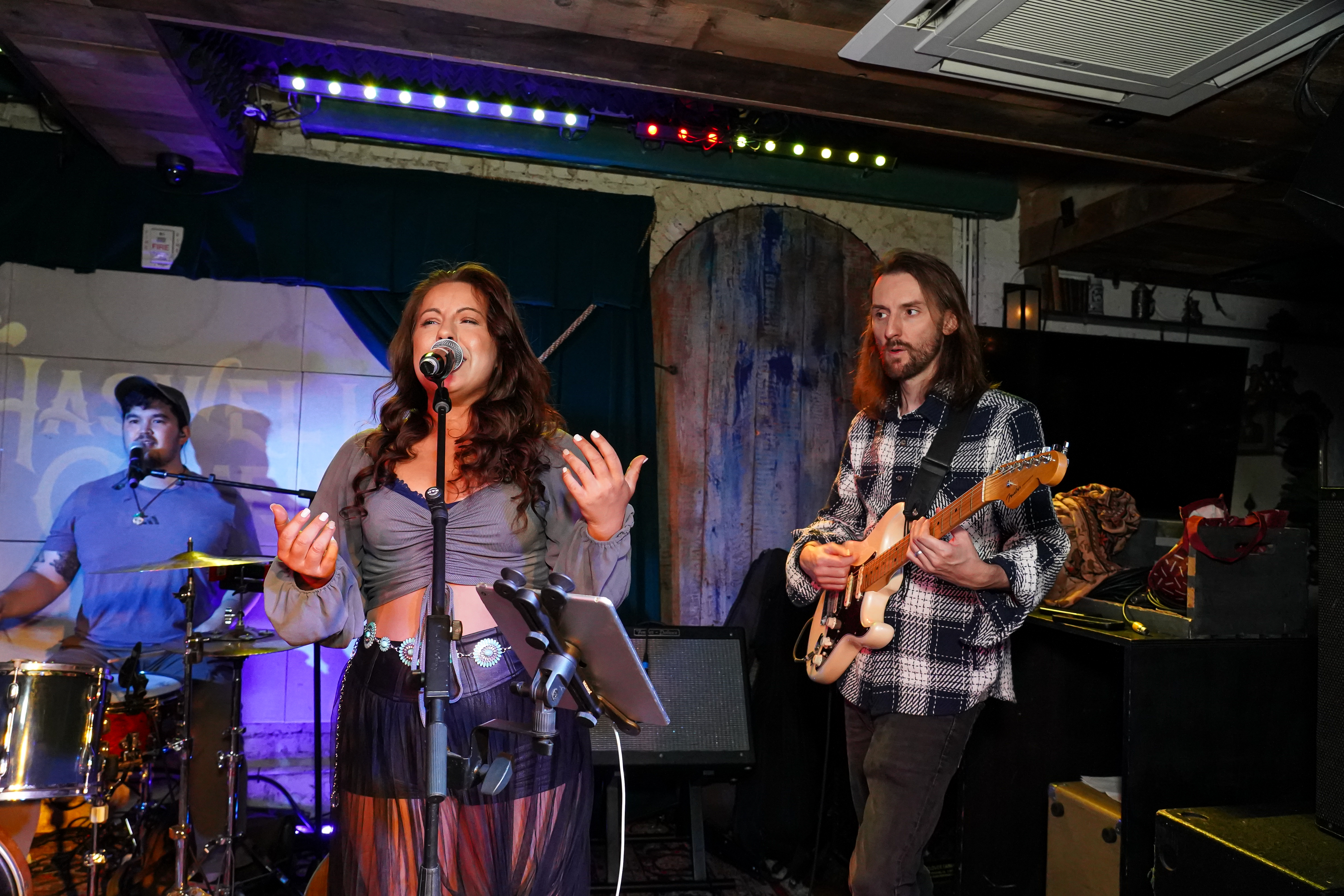 a woman standing on a stage
