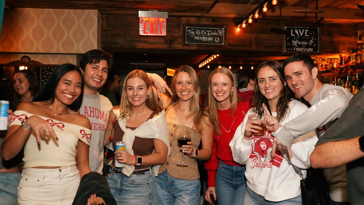 a group of people posing for a photo