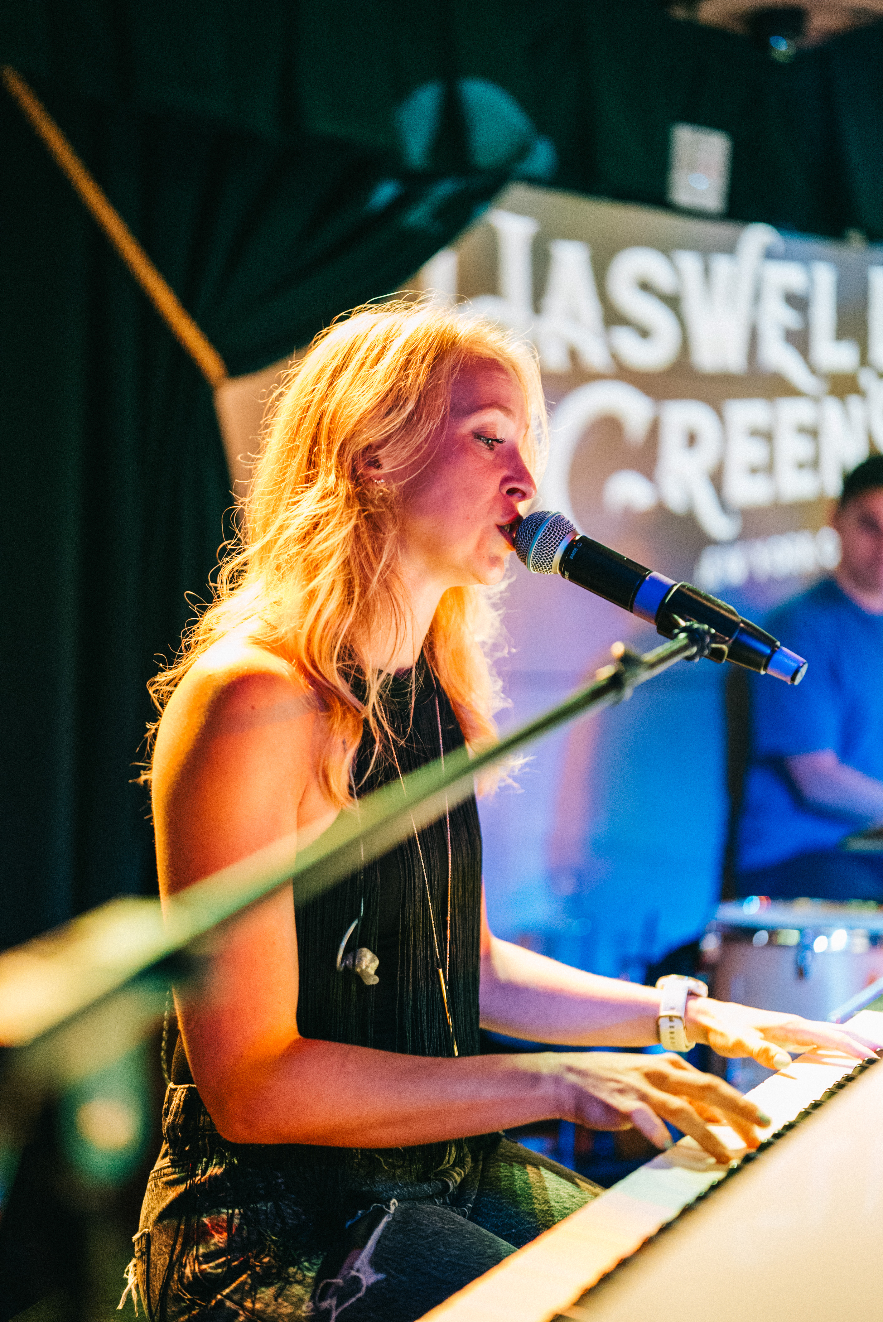 a woman standing on a stage