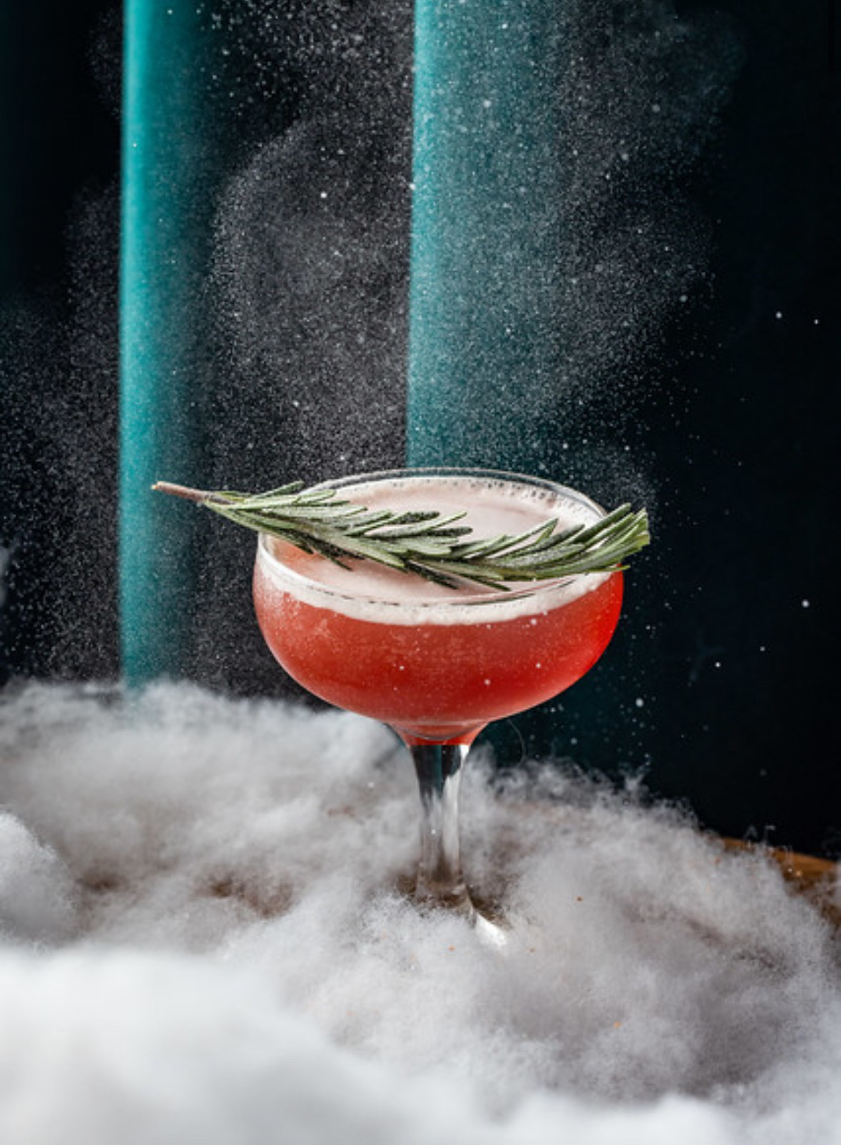 a fountain in front of a bowl of water