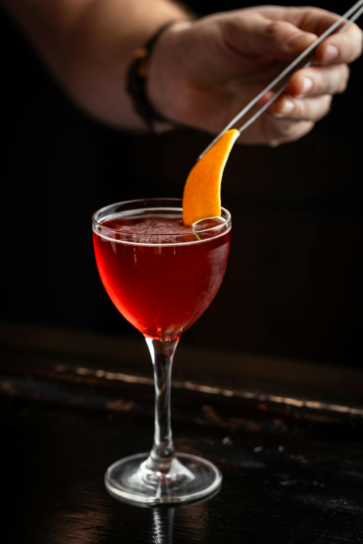 a person holding a wine glass