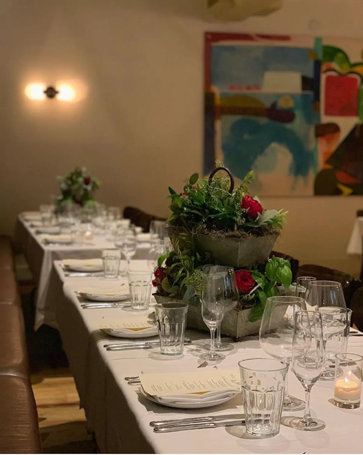 a dining table filled with wine glasses