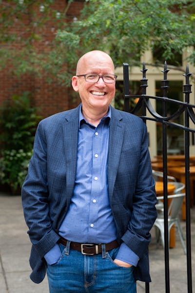 a man wearing a suit and tie