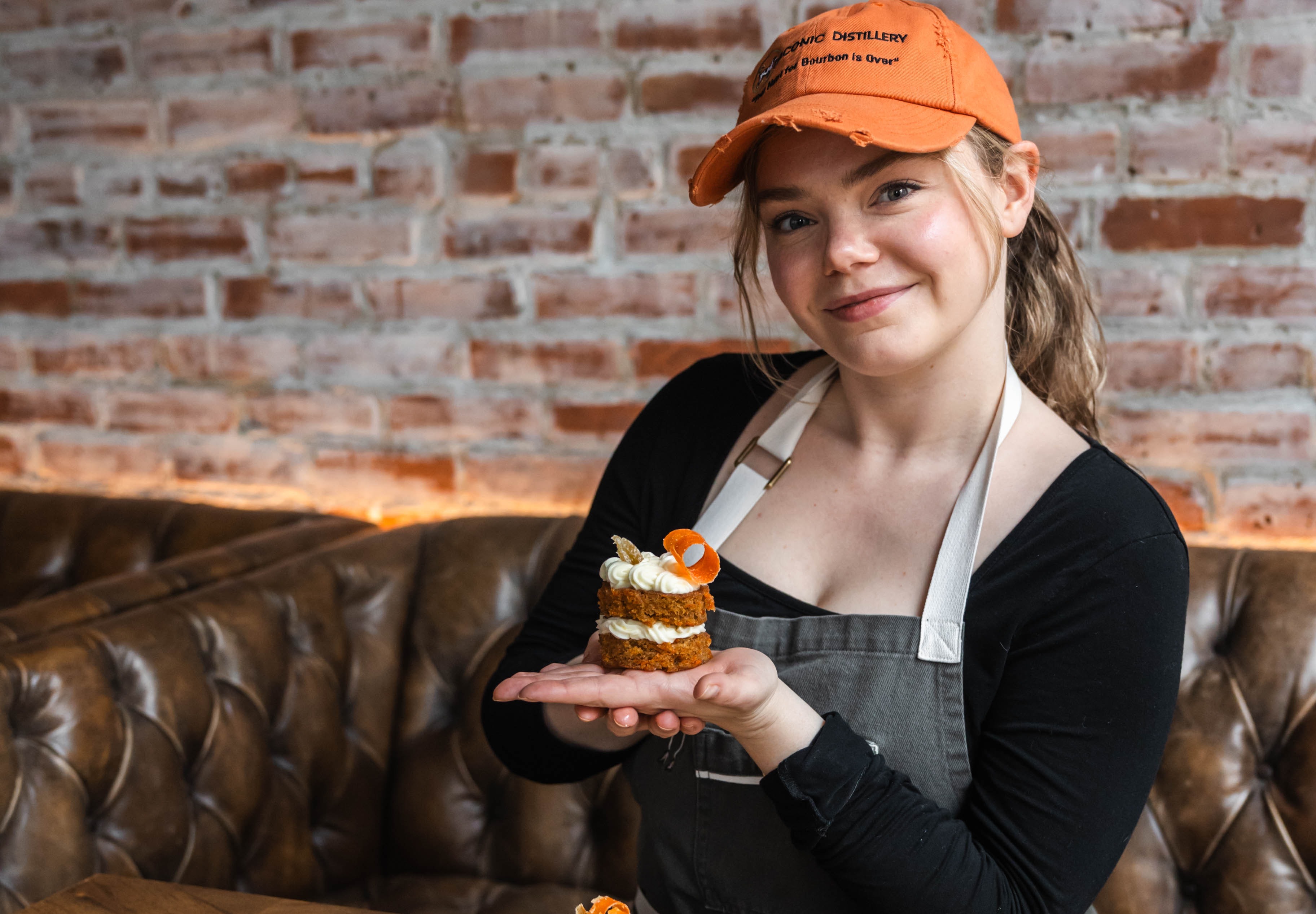 a woman eating a slice of pizza