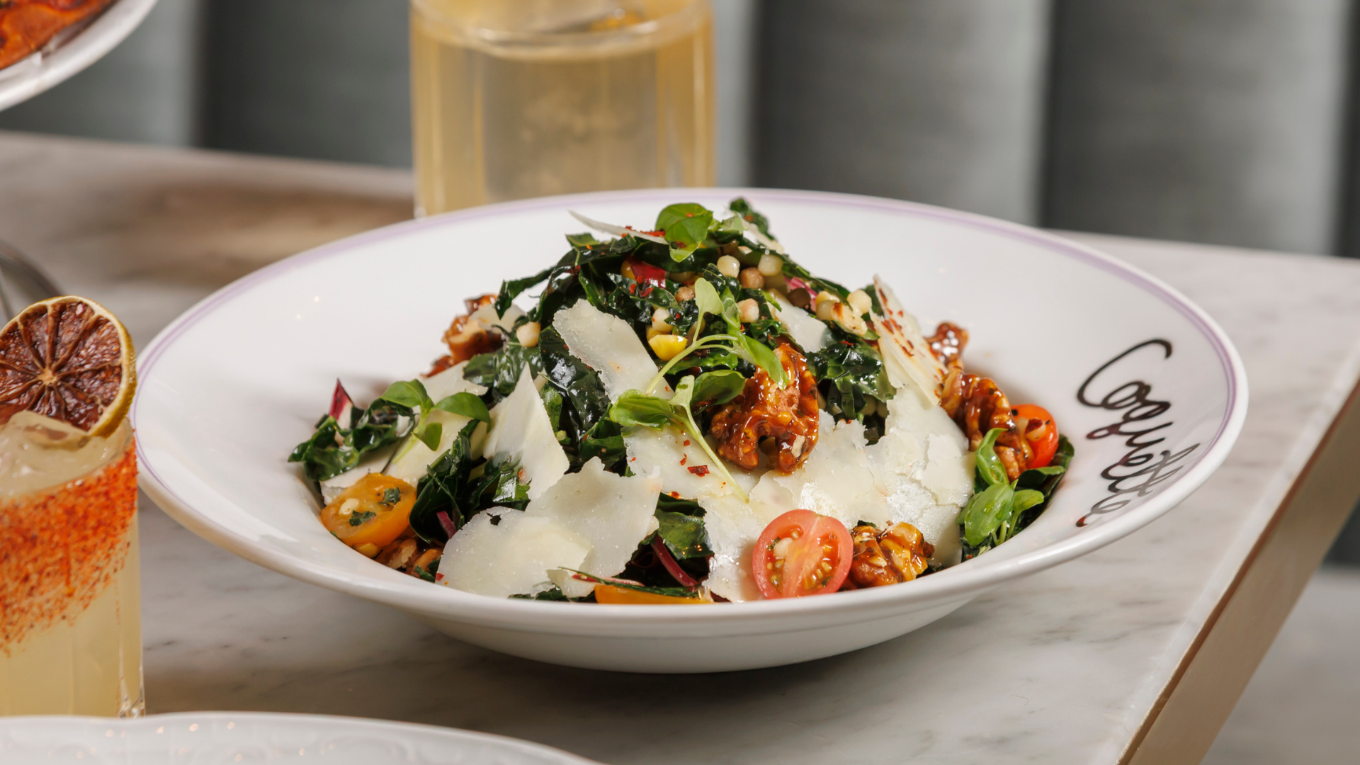 Tuscan Salad  Fregola & kale, rosso di treviso, grilled corn, cherry tomatoes, parmesan crema, honey walnuts