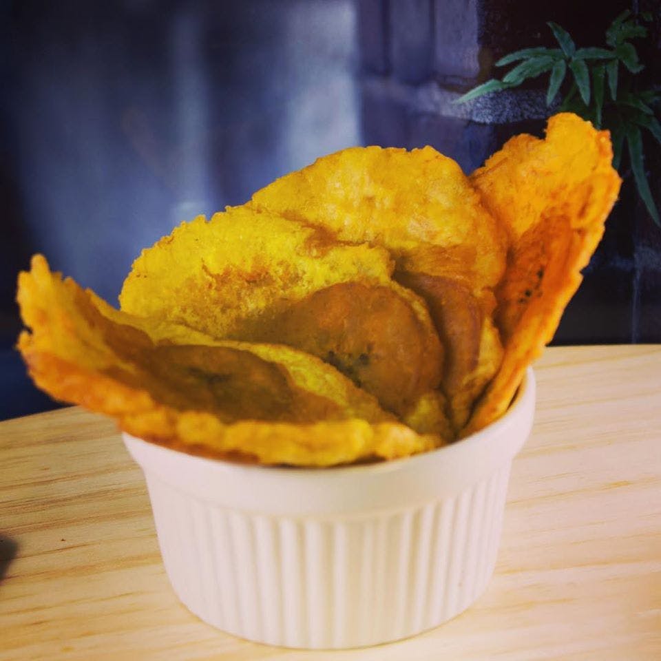 a small bowl filled with plantain chips