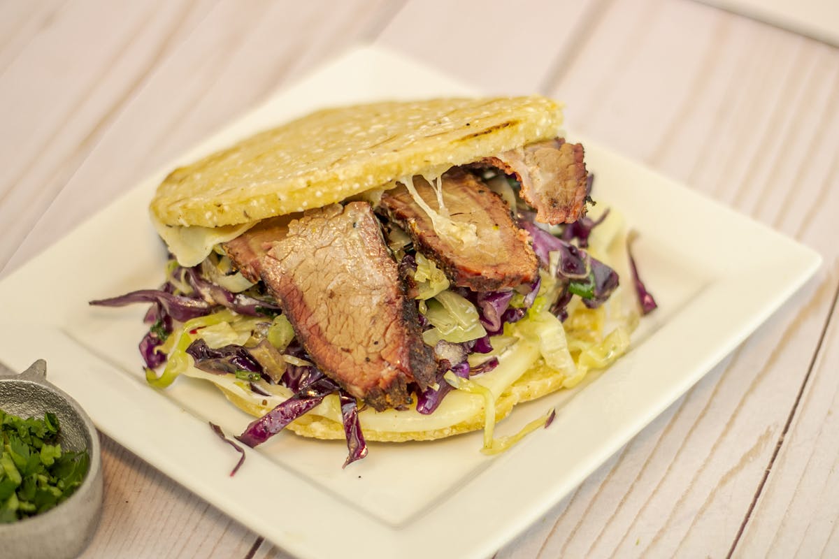 a sandwich cut in half on a plate