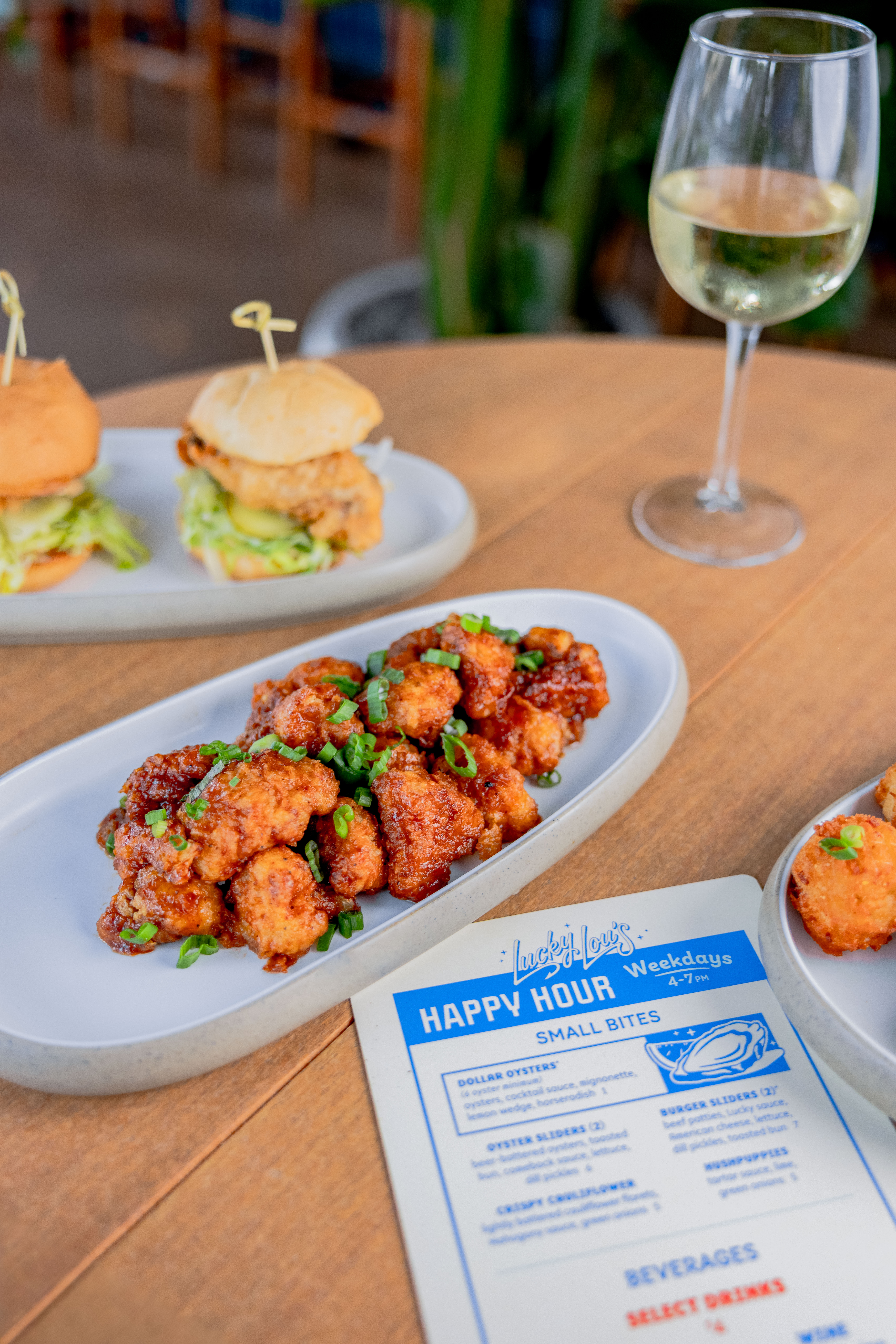 Happy Hour food and drink specials at Lucky Lou's Coastal Sports Bar in Deerfield Beach