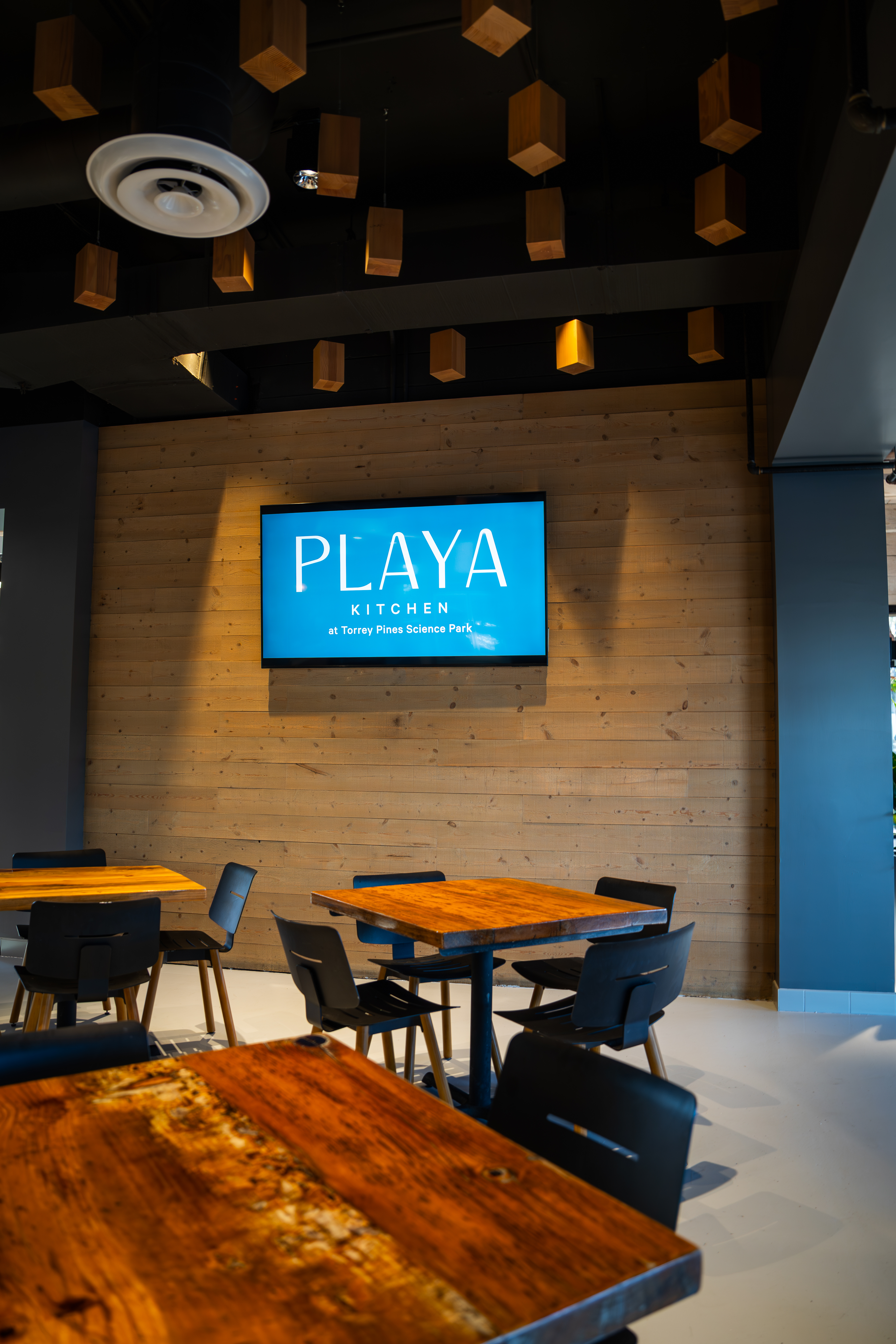 a room full of tables and chairs