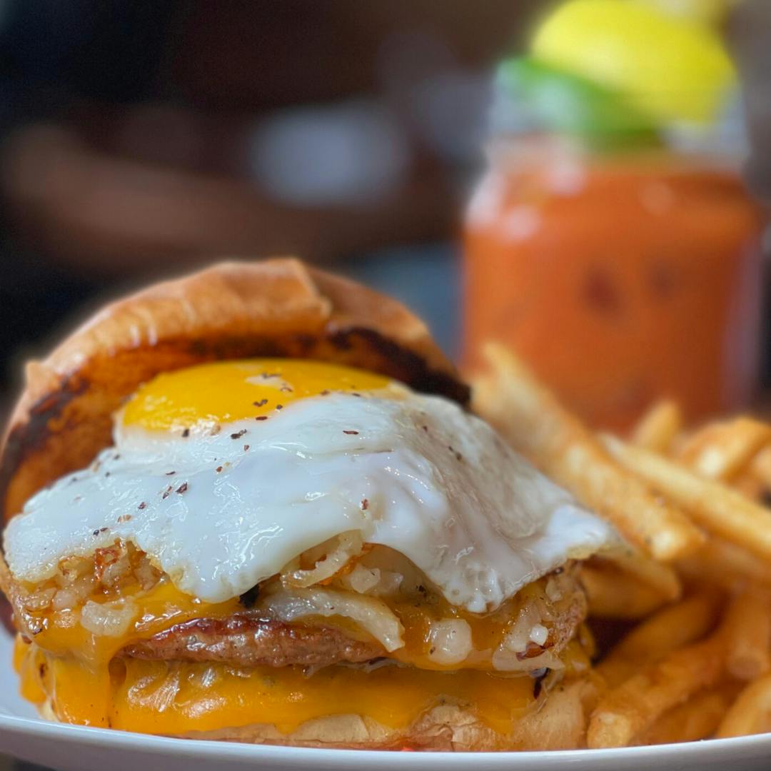 a close up of a sandwich with fries