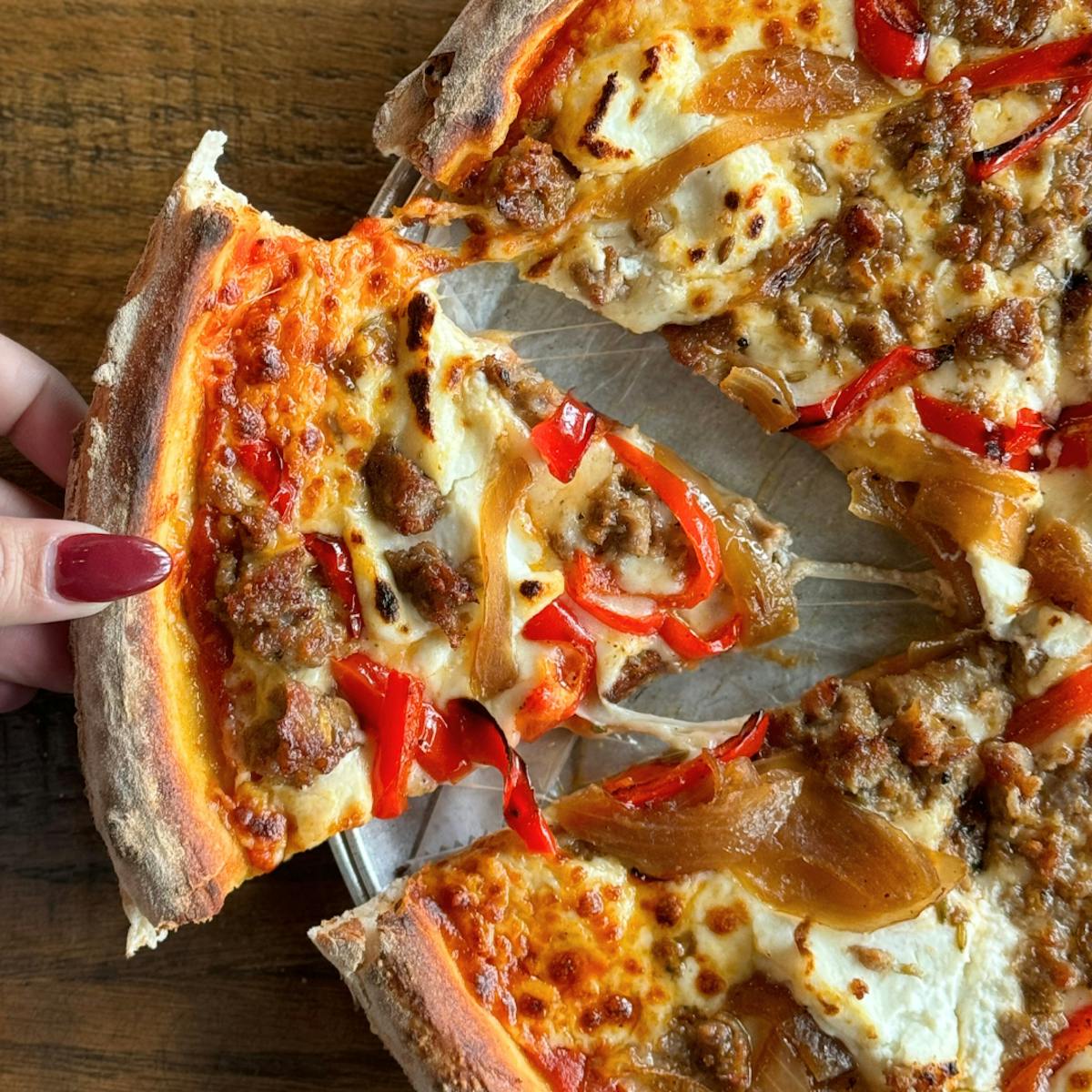 a close up of a slice of pizza
