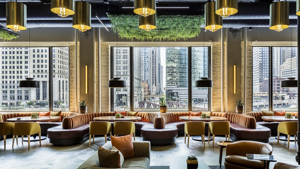 a dining room table in front of a window