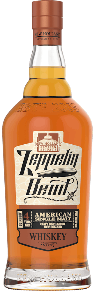 a sign on the side of a bottle with Jack Daniel's in the background