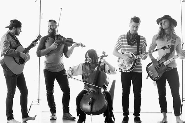 a group of people posing for the camera