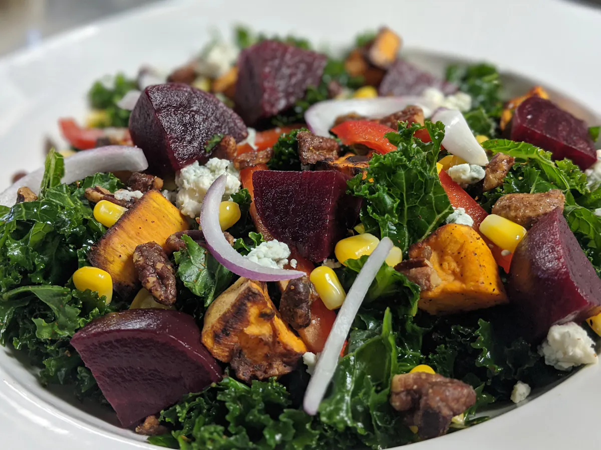a plate of food with meat and vegetables