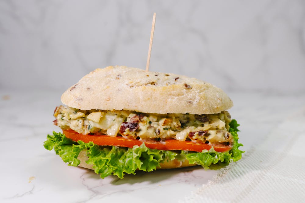 a close up of a sandwich sitting on top of a table