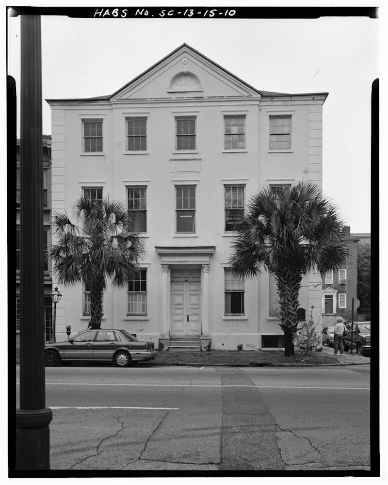 a person standing in front of a building