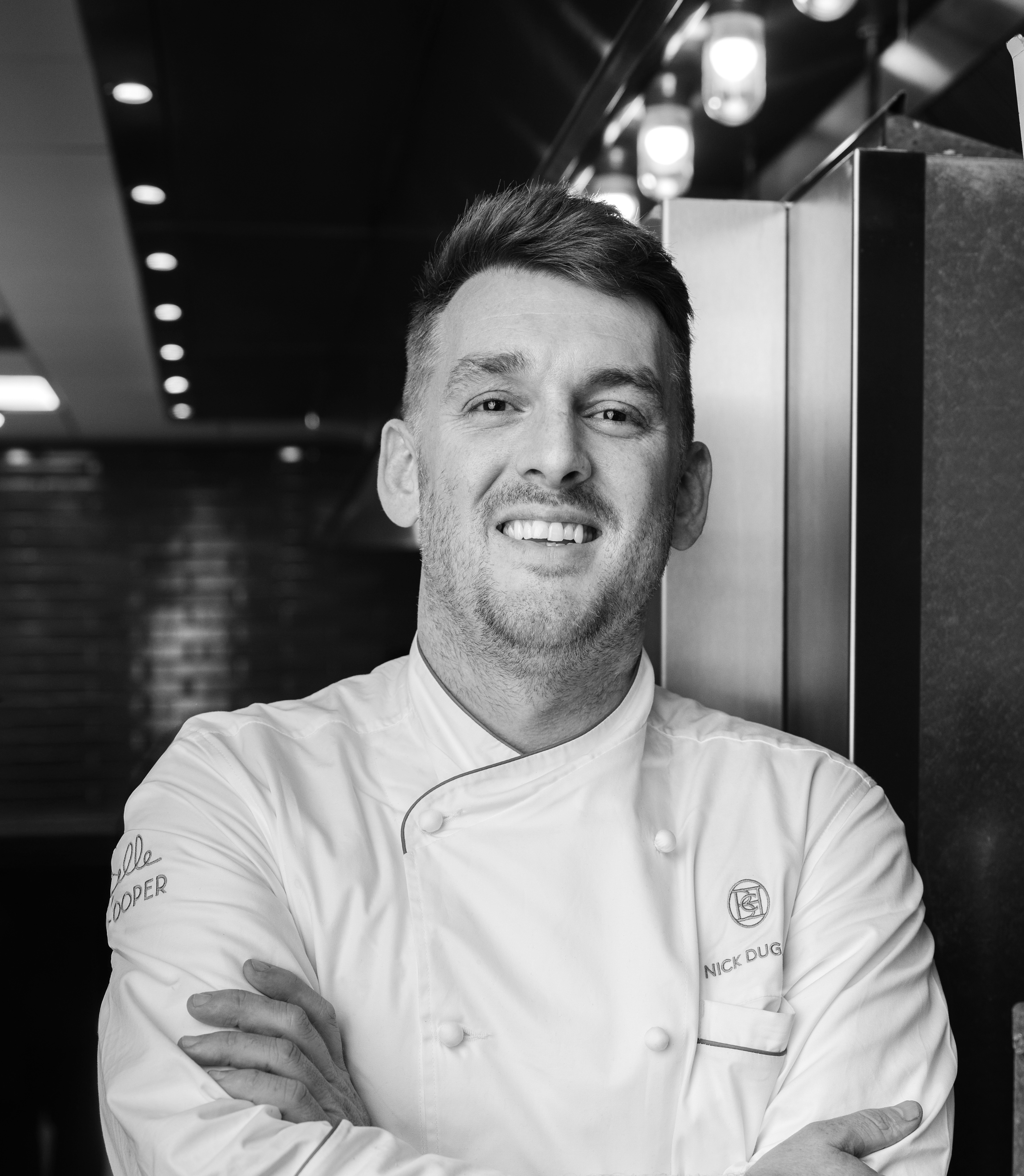 a man in a chef's coat