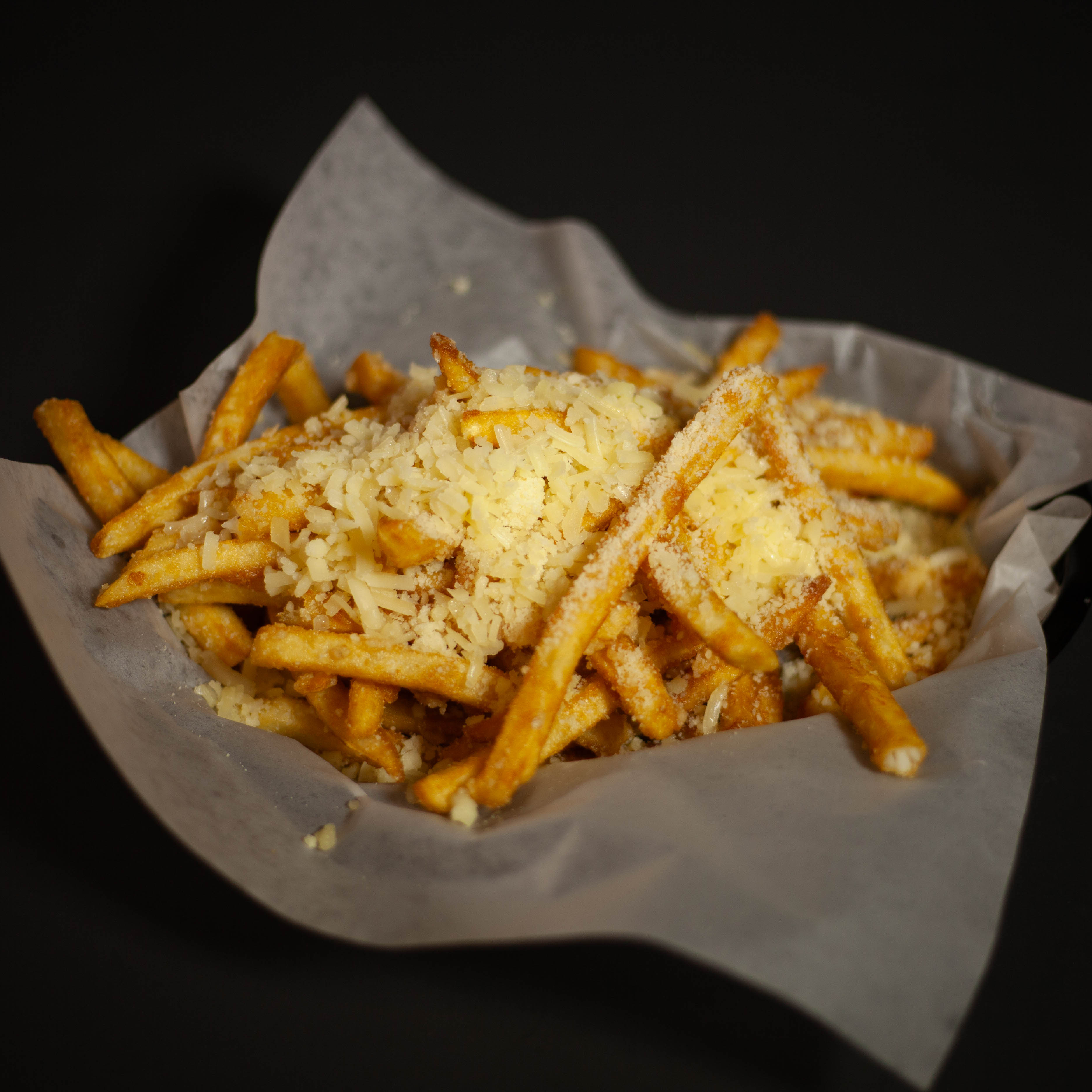 a sandwich sitting on top of a paper plate