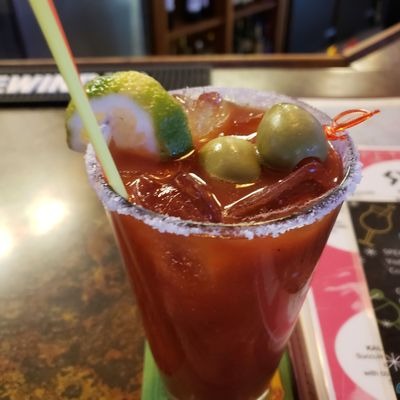 a glass of beer on a table