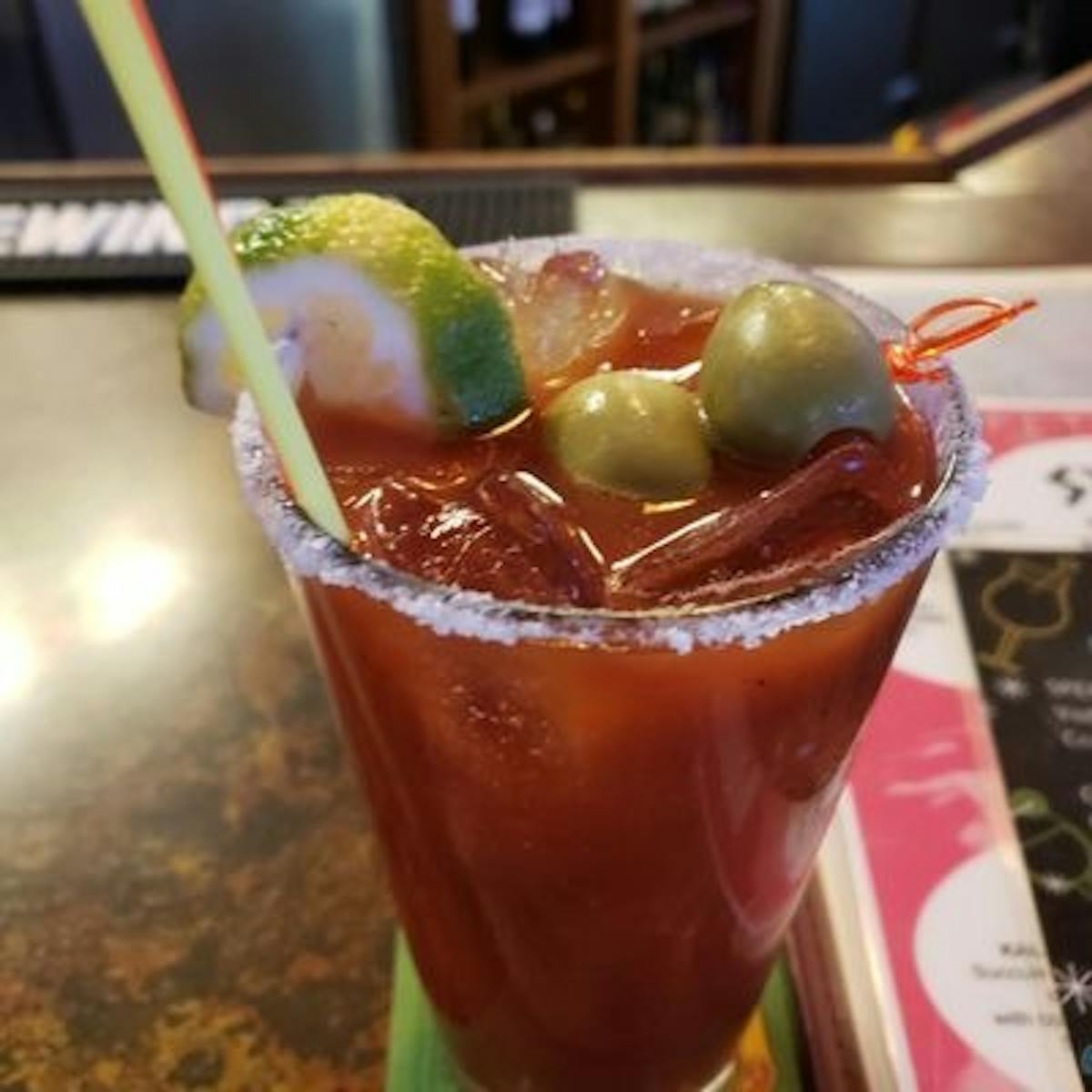 a glass of beer on a table