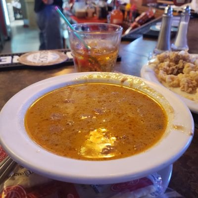 a plate of food and a cup of coffee