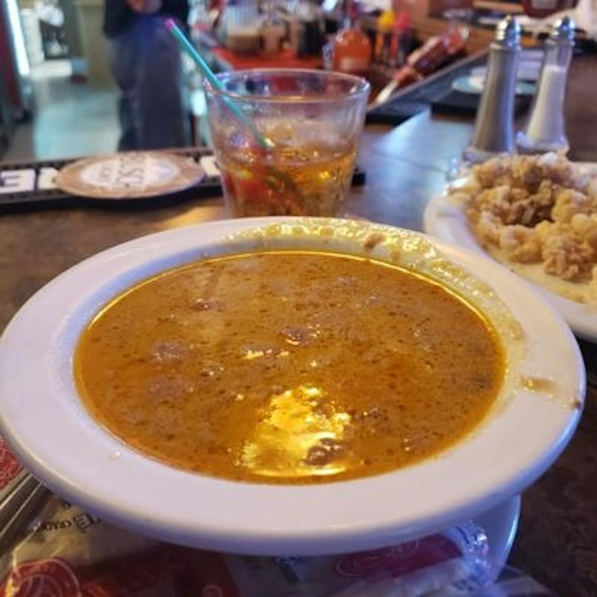 a plate of food and a cup of coffee