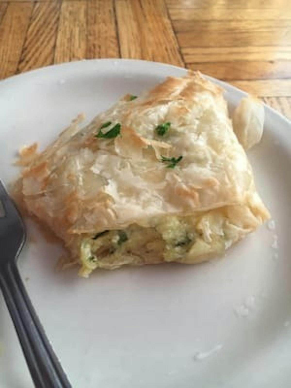 a plate of food with a fork