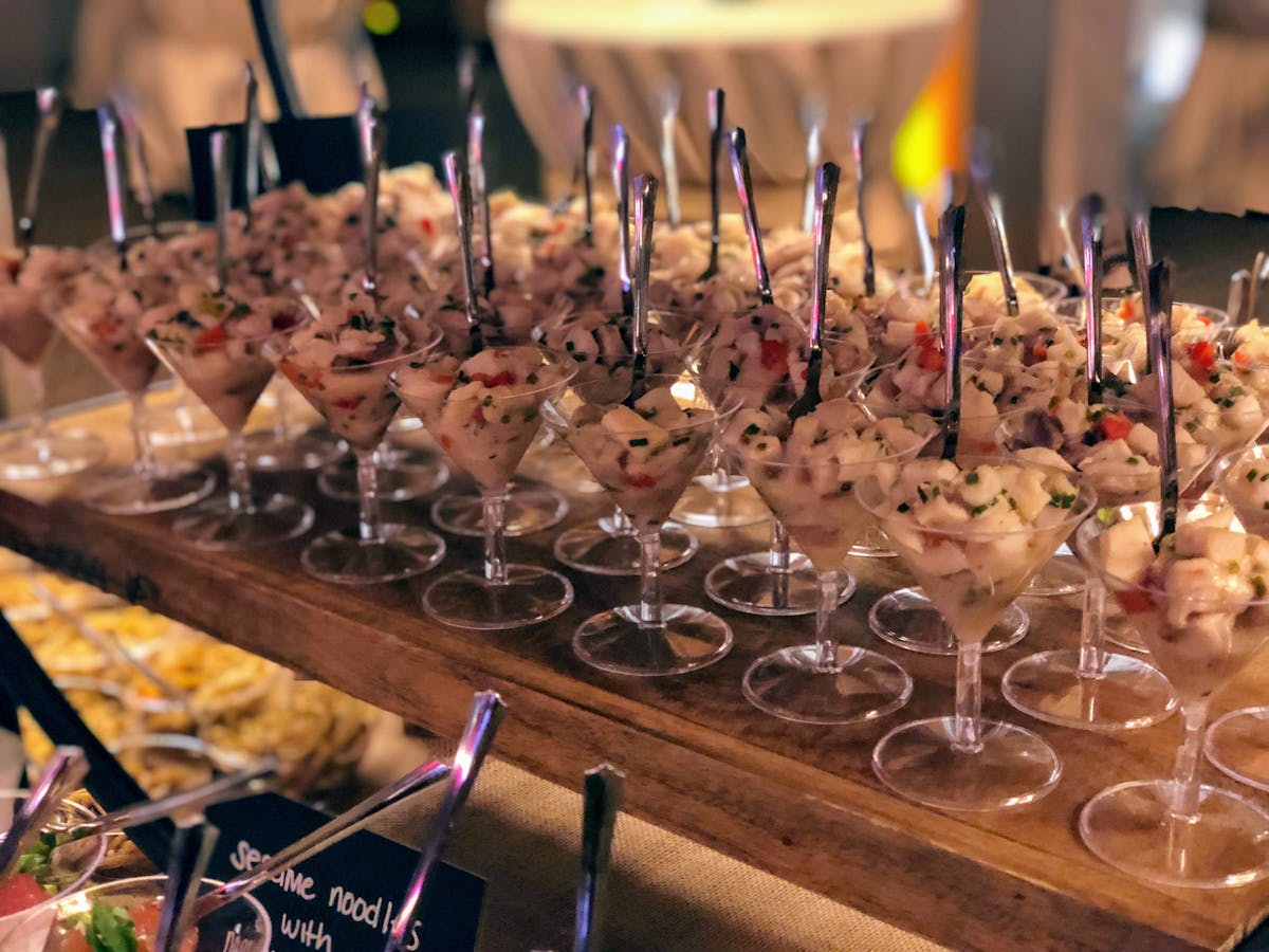 a table filled with wine glasses