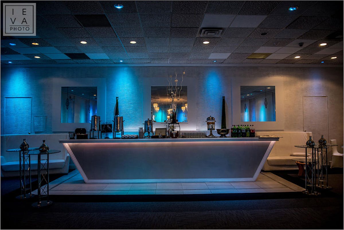 a kitchen with a blue light in a room