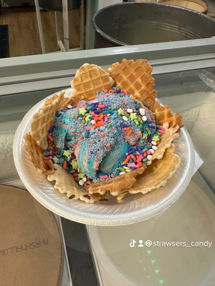 a cake sitting on top of a paper plate