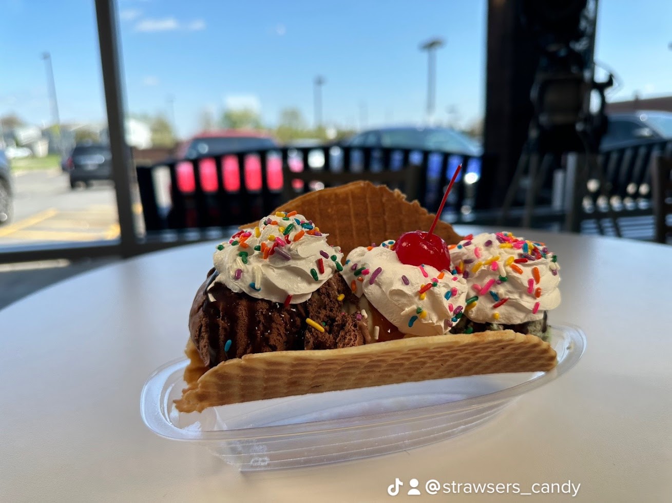 a cake sitting on top of a wooden table
