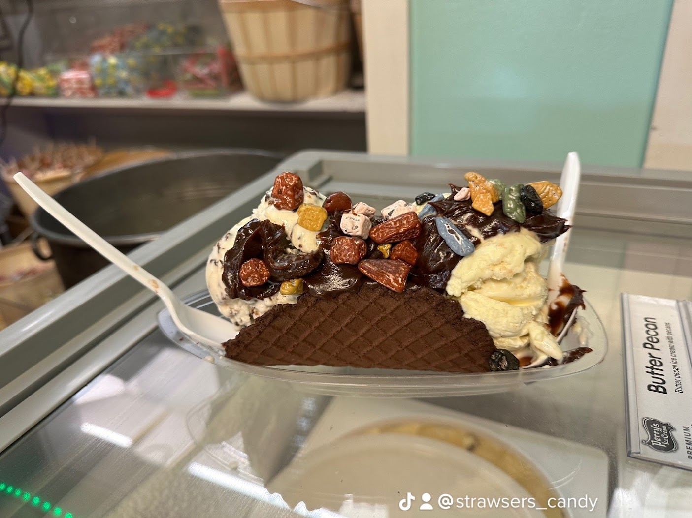 a plate of food with a slice of cake on a table