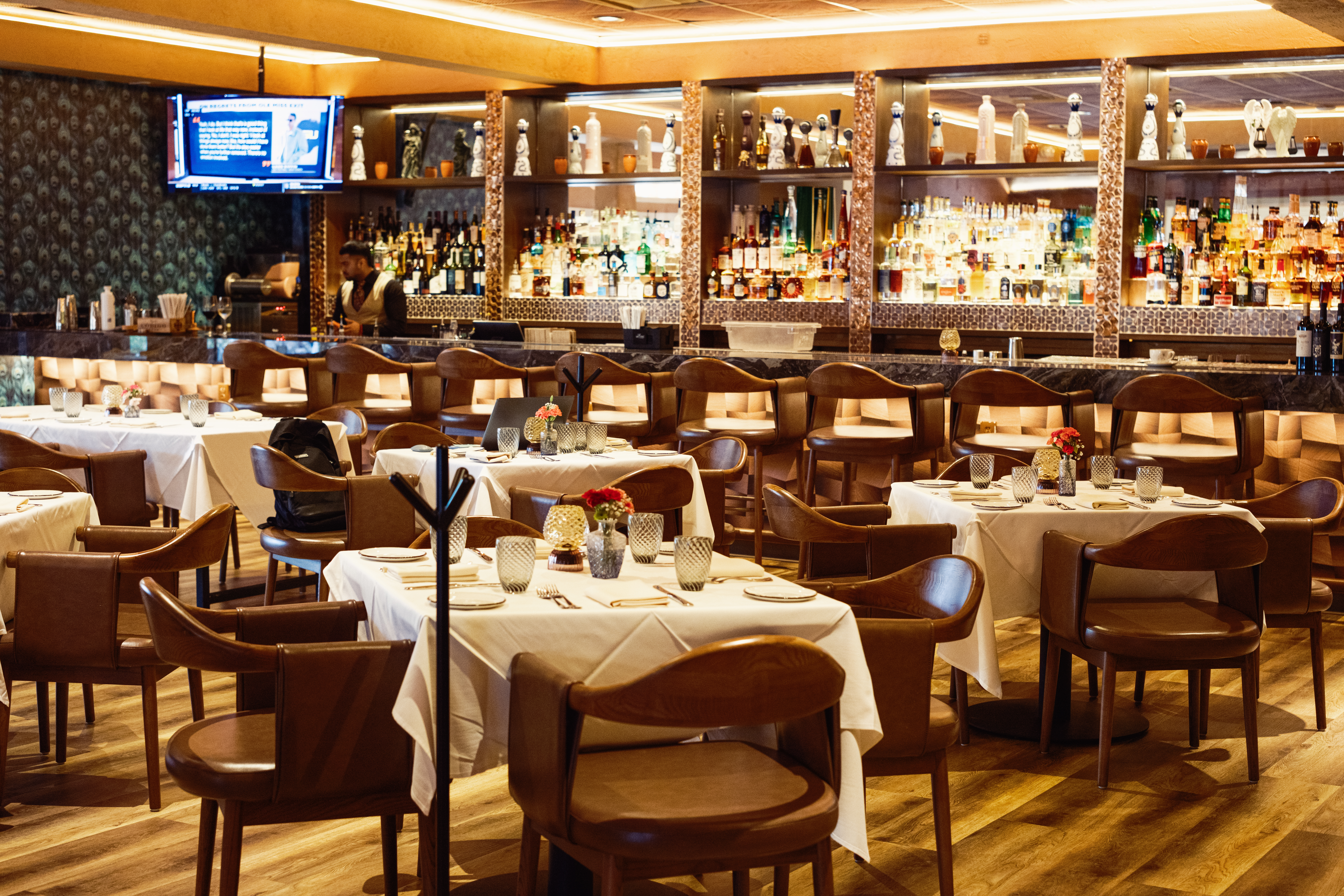 a restaurant with tables and chairs