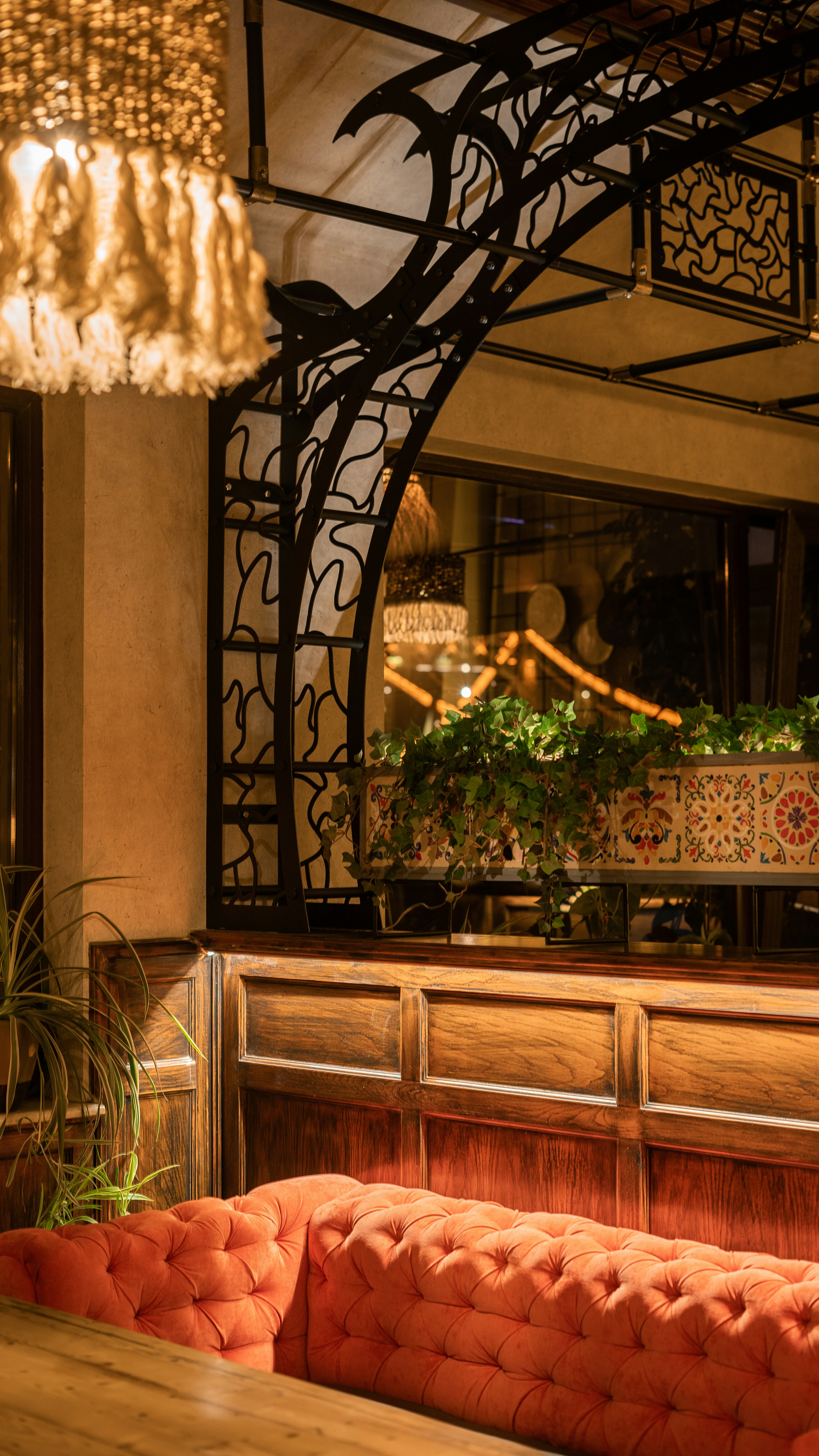 a room with a window and a planter